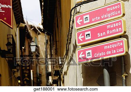 Directional signboards on a pole, Toledo, Spain View Large Photo Image Stock Image - Directional signboards on a pole, Toledo, Spain. Fotosearch