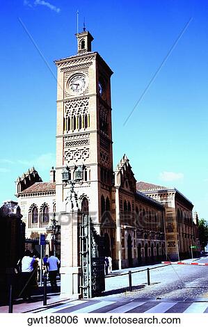 Low angle view of a clock tower at the roadside, Toledo, Spain View Large Photo Image Stock Photograph - Low angle view of a clock tower at the roadside, Toledo, Spain. Fotosearch