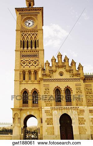 Low angle view of a clock tower, Toledo, Spain View Large Photo Image Stock Image - Low angle view of a clock tower, Toledo, Spain. Fotosearch