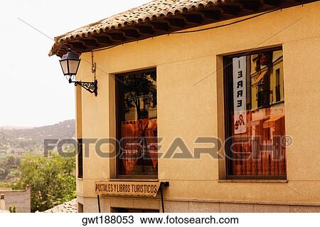 Low angle view of a lantern mounted on the wall of a building, Toledo, Spain View Large Photo Image Stock Image - Low angle view of a lantern mounted on the wall of a building, Toledo, Spain. Fotosearch