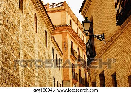 Low angle view of a lantern mounted on the wall of a building, Toledo, Spain View Large Photo Image Stock Photography - Low angle view of a lantern mounted on the wall of a building, Toledo, Spain. Fotosearch