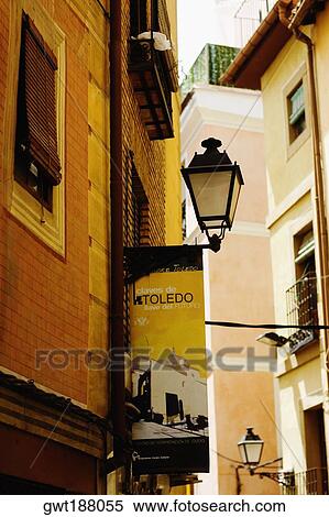 Low angle view of a lantern mounted on the wall of a building, Toledo, Spain View Large Photo Image Stock Photography - Low angle view of a lantern mounted on the wall of a building, Toledo, Spain. Fotosearch