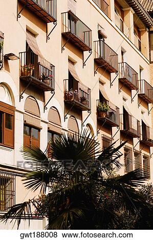 Stock Photo - Low angle view of balconies of a building, Toledo, Spain. Fotosearch