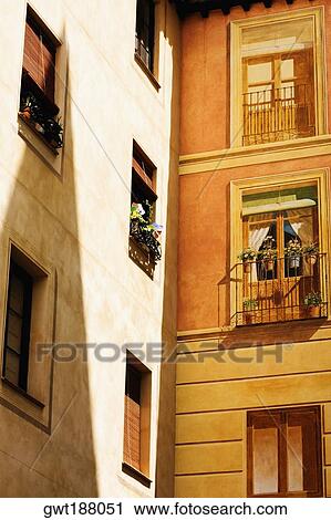 Low angle view of potted plants in a balcony, Toledo, Spain View Large Photo Image Stock Image - Low angle view of potted plants in a balcony, Toledo, Spain. Fotosearch
