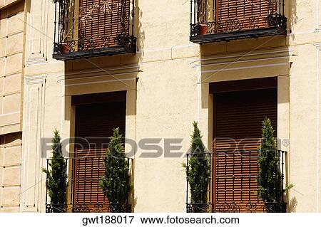 Potted plants in balconies of a house, Toledo, Spain View Large Photo Image Stock Photo - Potted plants in balconies of a house, Toledo, Spain. Fotosearch