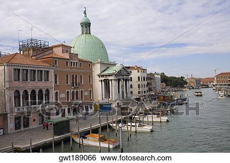 Boat docked near a church, Church Of San Simeon Piccolo, Venice, Italy View Large Photo Image Stock Photograph - Boat docked near a church, Church Of San Simeon Piccolo, Venice, Italy. Fotosearch