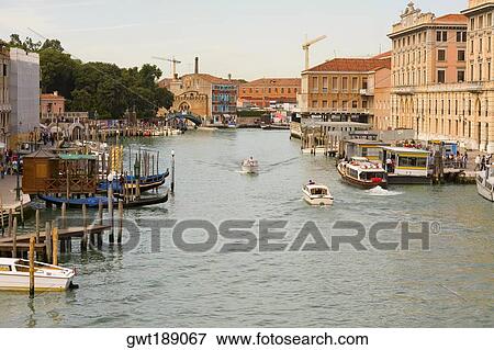 Boats docked in a canal, Grand Canal, Venice, Italy View Large Photo Image Stock Photo - Boats docked in a canal, Grand Canal, Venice, Italy. Fotosearch