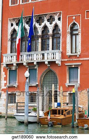 Boats docked in a canal, Venice, Italy View Large Photo Image Stock Image - Boats docked in a canal, Venice, Italy. Fotosearch