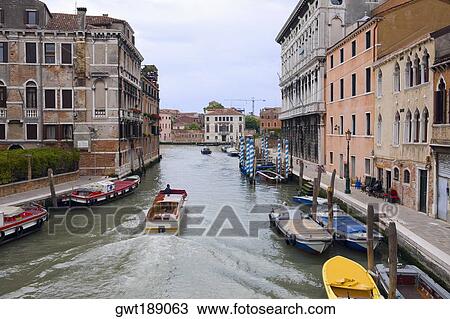 Boats in a canal, Venice, Italy View Large Photo Image Stock Image - Boats in a canal, Venice, Italy. Fotosearch