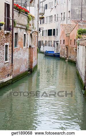 Buildings along a canal, Venice, Italy View Large Photo Image Stock Photo - Buildings along a canal, Venice, Italy. Fotosearch