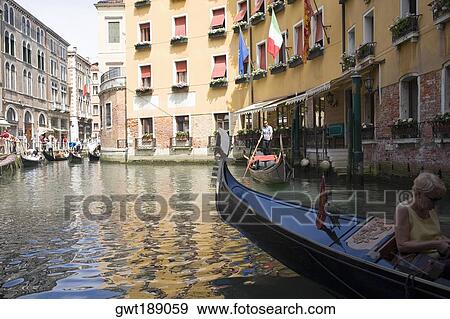 Gondolas in a canal, Venice, Italy View Large Photo Image Stock Photo - Gondolas in a canal, Venice, Italy. Fotosearch