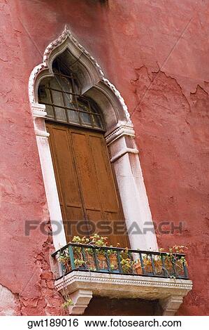 Low angle view of a balcony of a building, Venice, Italy View Large Photo Image Stock Photograph - Low angle view of a balcony of a building, Venice, Italy. Fotosearch