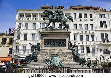 Low angle view of statues in front of a building, Vittorio Emanuele II Statue, Riva Degli Schiavoni, Venice, Italy View Large Photo Image Stock Photo - Low angle view of statues in front of a building, Vittorio Emanuele II Statue, Riva Degli Schiavoni, Venice, Italy. Fotosearch