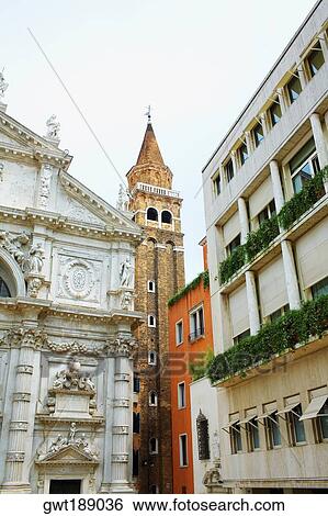Low angle view of the bell tower and a church, Venice, Italy View Large Photo Image Stock Photograph - Low angle view of the bell tower and a church, Venice, Italy. Fotosearch