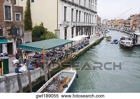 Restaurant at the waterfront, Venice, Italy View Large Photo Image Stock Photography - Restaurant at the waterfront, Venice, Italy. Fotosearch
