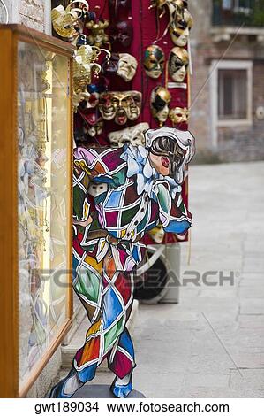 Picture - Sculpture at a masquerade shop entrance, Venice, Italy. Fotosearch