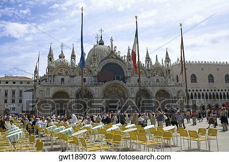 Tourists walking in front of a church, St. Mark's Cathedral, St. Mark's Square, Venice, Italy View Large Photo Image Stock Image - Tourists walking in front of a church, St. Mark's Cathedral, St. Mark's Square, Venice, Italy. Fotosearch