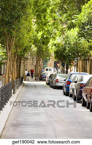 Stock Image - Cars parked on a street, Madrid, Spain. Fotosearch