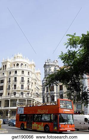 Double decker bus on a road in a city, Madrid, Spain View Large Photo Image Stock Photograph - Double decker bus on a road in a city, Madrid, Spain. Fotosearch