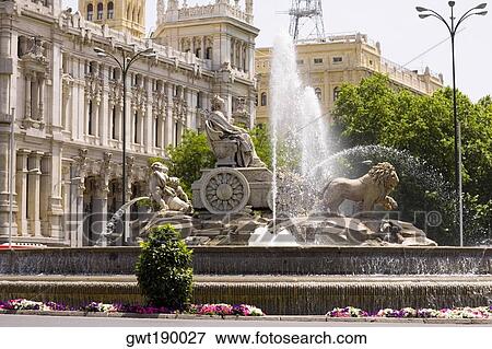Fountain in front of a government building, Cibeles Fountain, Plaza de Cibeles, Palacio De Comunicaciones, Madrid, Spain View Large Photo Image Stock Photo - Fountain in front of a government building, Cibeles Fountain, Plaza de Cibeles, Palacio De Comunicaciones, Madrid, Spain. Fotosearch
