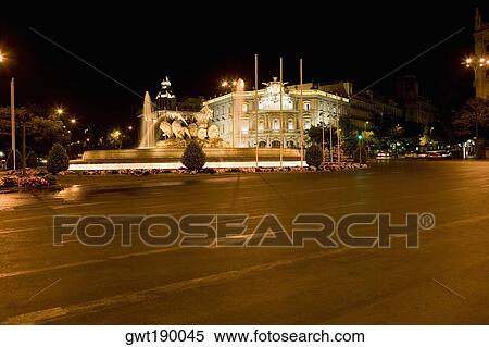Fountain in front of a palace lit up at night, Cibeles Fountain, Palacio de Linares, Plaza de Cibeles, Madrid, Spain View Large Photo Image Stock Photography - Fountain in front of a palace lit up at night, Cibeles Fountain, Palacio de Linares, Plaza de Cibeles, Madrid, Spain. Fotosearch