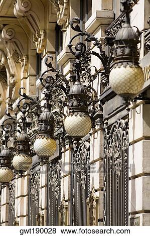 Lanterns on a building, Madrid, Spain View Large Photo Image Stock Photo - Lanterns on a building, Madrid, Spain. Fotosearch