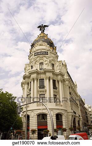 Low angle view of a building, Metropolis Building, Madrid, Spain View Large Photo Image Stock Image - Low angle view of a building, Metropolis Building, Madrid, Spain. Fotosearch