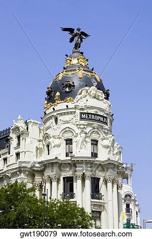 Low angle view of a building, Metropolis Building, Madrid, Spain View Large Photo Image Stock Photo - Low angle view of a building, Metropolis Building, Madrid, Spain. Fotosearch