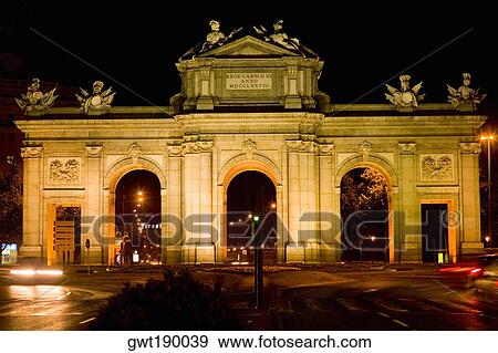 Memorial gate lit up at night, Alcala Gate, Madrid, Spain View Large Photo Image Stock Photo - Memorial gate lit up at night, Alcala Gate, Madrid, Spain. Fotosearch