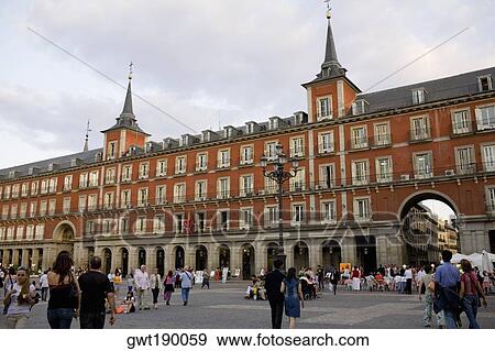 Stock Photo - Tourists in front of a building, Plaza Mayor, Madrid, Spain. Fotosearch