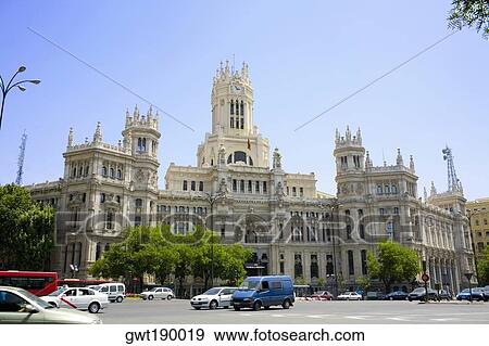 Traffic in front of a government building, Palacio De Comunicaciones, Plaza de Cibeles, Madrid, Spain View Large Photo Image Stock Photo - Traffic in front of a government building, Palacio De Comunicaciones, Plaza de Cibeles, Madrid, Spain. Fotosearch