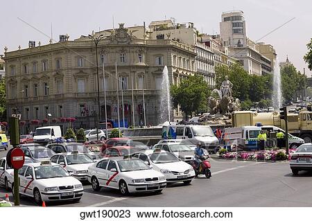 Traffic on a road in front of a palace, Cibeles Fountain, Palacio de Linares, Plaza de Cibeles, Madrid, Spain View Large Photo Image Stock Image - Traffic on a road in front of a palace, Cibeles Fountain, Palacio de Linares, Plaza de Cibeles, Madrid, Spain. Fotosearch