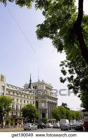 Traffic on a road in front of a building, Madrid, Spain View Large Photo Image Stock Photo - Traffic on a road in front of a building, Madrid, Spain. Fotosearch