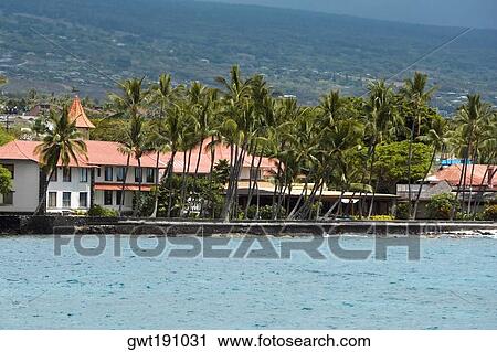Stock Image - Buildings at the waterfront, Kona, Big Island, Hawaii Islands, USA. Fotosearch