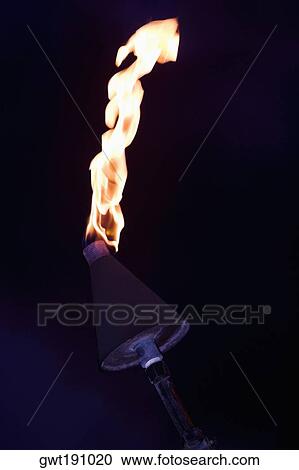 Close-up of a burning flaming torch View Large Photo Image Stock Image - Close-up of a burning flaming torch. Fotosearch