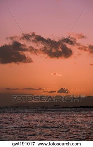 Stock Photo - Clouds over the sea, Waikiki Beach, Honolulu, Oahu, Hawaii Islands, USA. Fotosearch