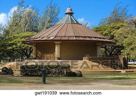 Stock Photo - Hedge in front of a building, Waikiki Beach, Honolulu, Oahu, Hawaii Islands, USA. Fotosearch