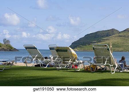 Lounge chairs on the beach, Nawiliwili Beach Park, Kauai, Hawaii Islands, USA View Large Photo Image Stock Image - Lounge chairs on the beach, Nawiliwili Beach Park, Kauai, Hawaii Islands, USA. Fotosearch