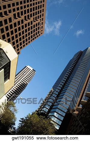 Low angle view of skyscrapers in a city, Honolulu, Oahu, Hawaii Islands, USA View Large Photo Image Stock Photography - Low angle view of skyscrapers in a city, Honolulu, Oahu, Hawaii Islands, USA. Fotosearch