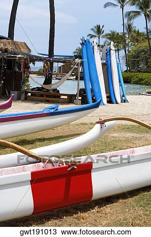 Outriggers and surfboards on the beach, Kona, Big Island, Hawaii Islands, USA View Large Photo Image Stock Image - Outriggers and surfboards on the beach, Kona, Big Island, Hawaii Islands, USA. Fotosearch