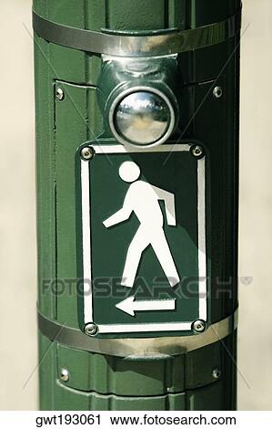 Stock Image - Close-up of a pedestrian crossing sign, Honolulu, Oahu, Hawaii Islands, USA. Fotosearch
