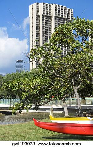 Stock Image - Low angle view of a skyscraper in a city, Honolulu, Oahu, Hawaii Islands, USA. Fotosearch