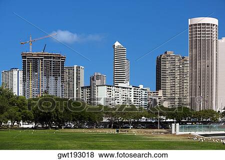 Skyscrapers in a city, Honolulu, Oahu, Hawaii Islands, USA View Large Photo Image Stock Photo - Skyscrapers in a city, Honolulu, Oahu, Hawaii Islands, USA. Fotosearch