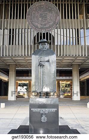 Statue in front of a shield of Hawaiian state, Honolulu, Oahu, Hawaii Islands, USA View Large Photo Image Stock Photograph - Statue in front of a shield of Hawaiian state, Honolulu, Oahu, Hawaii Islands, USA. Fotosearch