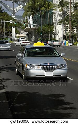 Taxi moving on the road, Honolulu, Oahu, Hawaii Islands, USA View Large Photo Image Stock Image - Taxi moving on the road, Honolulu, Oahu, Hawaii Islands, USA. Fotosearch
