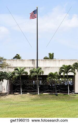 American flag fluttering in front of a building, Pearl Harbor, Honolulu, Oahu, Hawaii Islands, USA View Large Photo Image Stock Photography - American flag fluttering in front of a building, Pearl Harbor, Honolulu, Oahu, Hawaii Islands, USA. Fotosearch