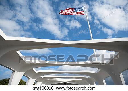 Low angle view of an American flag fluttering on a memorial building, USS Arizona Memorial, Pearl Harbor, Honolulu, Oahu, Hawaii Islands, USA View Large Photo Image Stock Photograph - Low angle view of an American flag fluttering on a memorial building, USS Arizona Memorial, Pearl Harbor, Honolulu, Oahu, Hawaii Islands, USA. Fotosearch