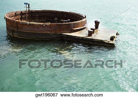 Memorial structure in the sea, Arizona Gun Turret, USS Arizona Memorial, Pearl Harbor, Honolulu, Oahu, Hawaii Islands, USA View Large Photo Image Stock Photo - Memorial structure in the sea, Arizona Gun Turret, USS Arizona Memorial, Pearl Harbor, Honolulu, Oahu, Hawaii Islands, USA. Fotosearch