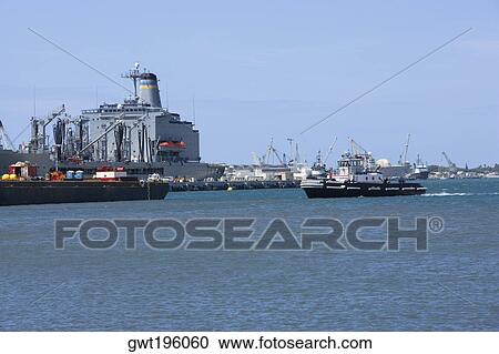 Military ships at a commercial dock, Pearl Harbor, Honolulu, Oahu, Hawaii Islands, USA View Large Photo Image Stock Image - Military ships at a commercial dock, Pearl Harbor, Honolulu, Oahu, Hawaii Islands, USA. Fotosearch