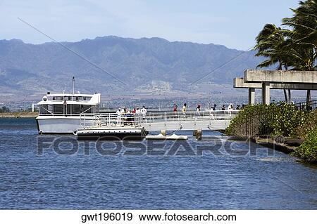 Tourboat in the sea, Pearl Harbor, Honolulu, Oahu, Hawaii Islands, USA View Large Photo Image Stock Photo - Tourboat in the sea, Pearl Harbor, Honolulu, Oahu, Hawaii Islands, USA. Fotosearch